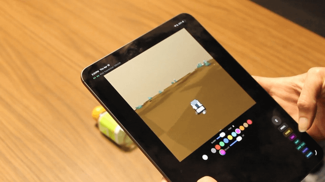 I made a tiny world model game that runs locally on iPad